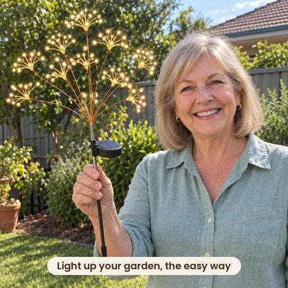 Woman holding HiLuci Starburst Lights in her garden
